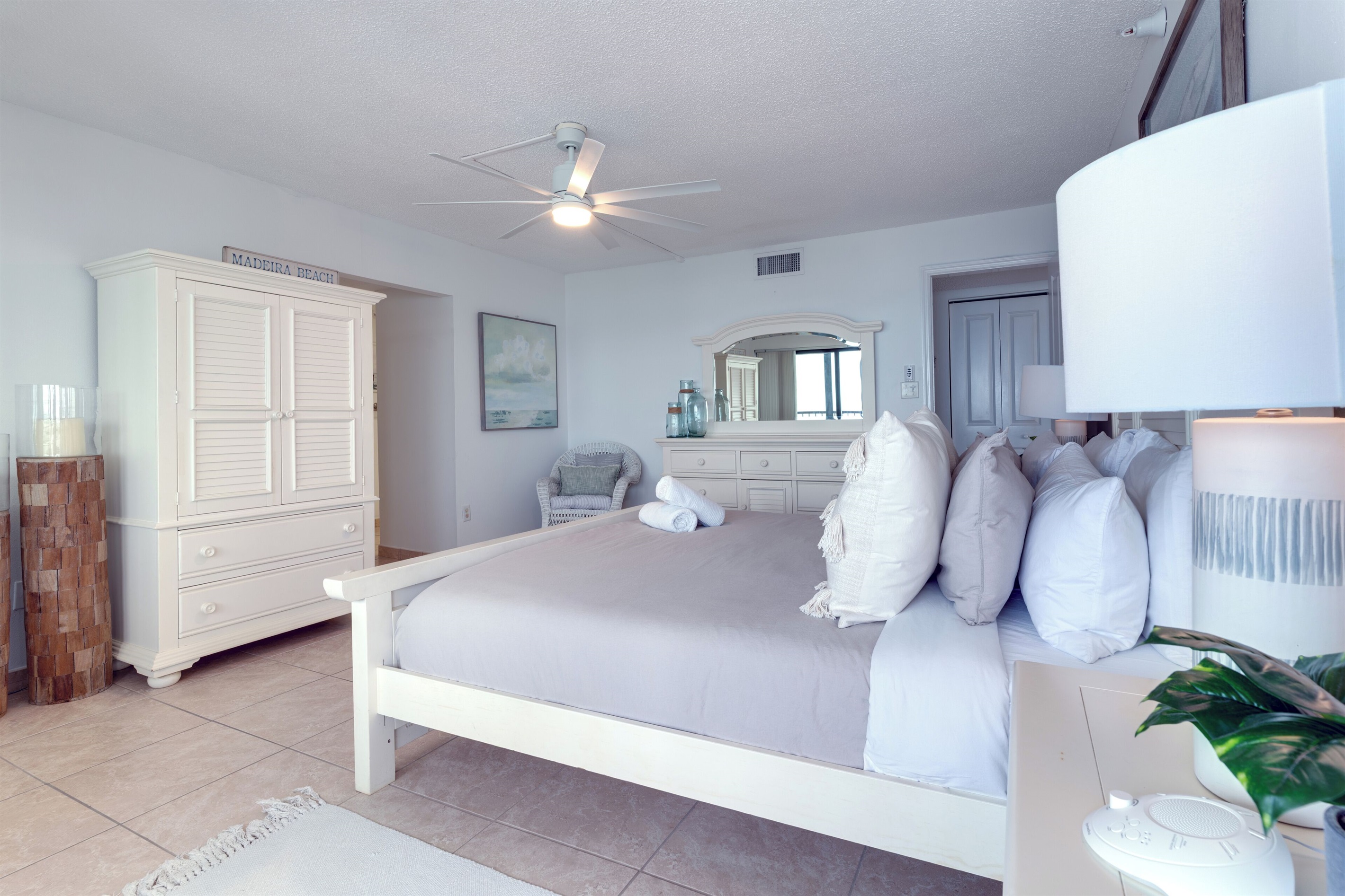 Very spacious main bedroom with plenty of storage, a TV, and an ensuite bath.