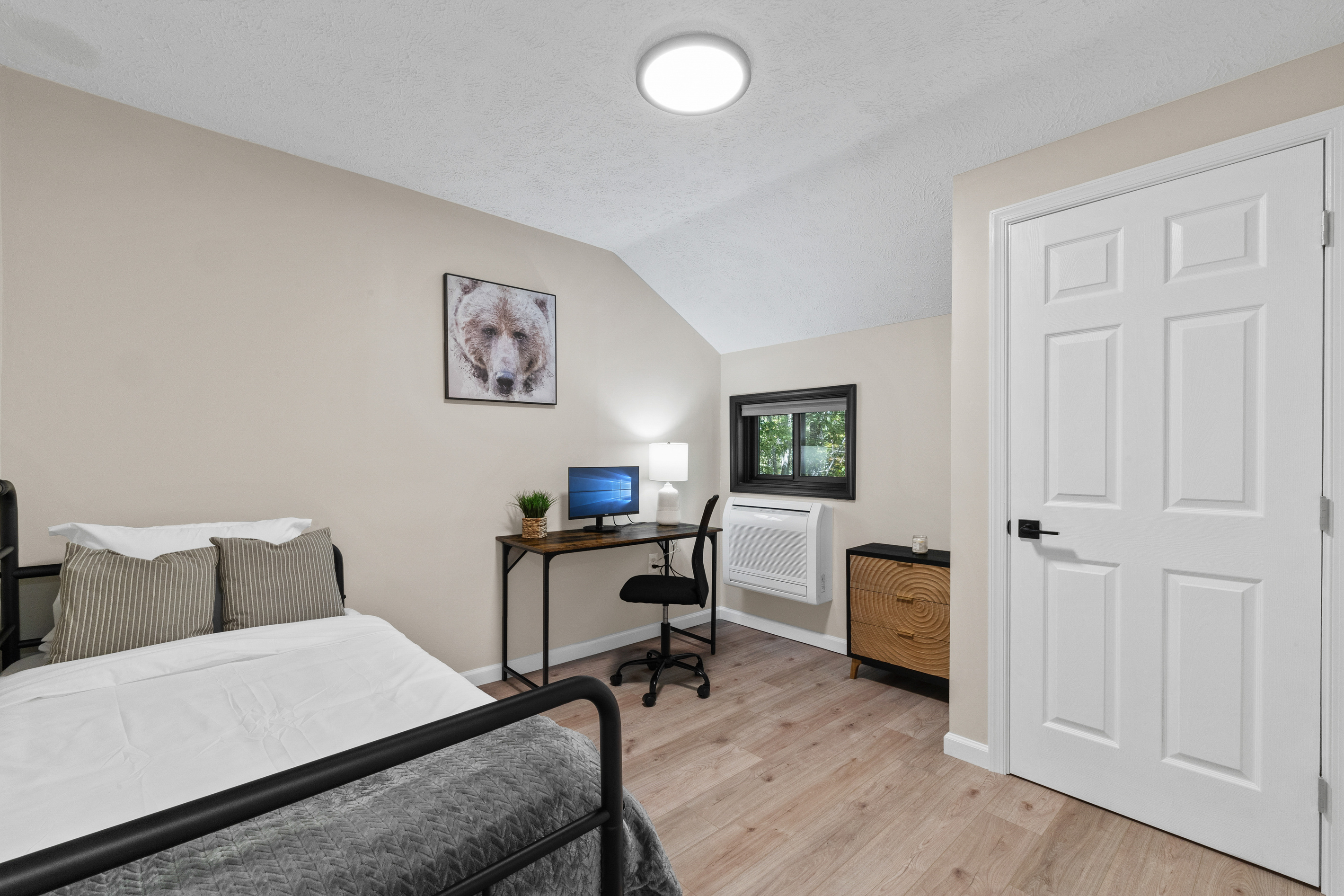 This second floor room is versatile featuring a comfortable daybed