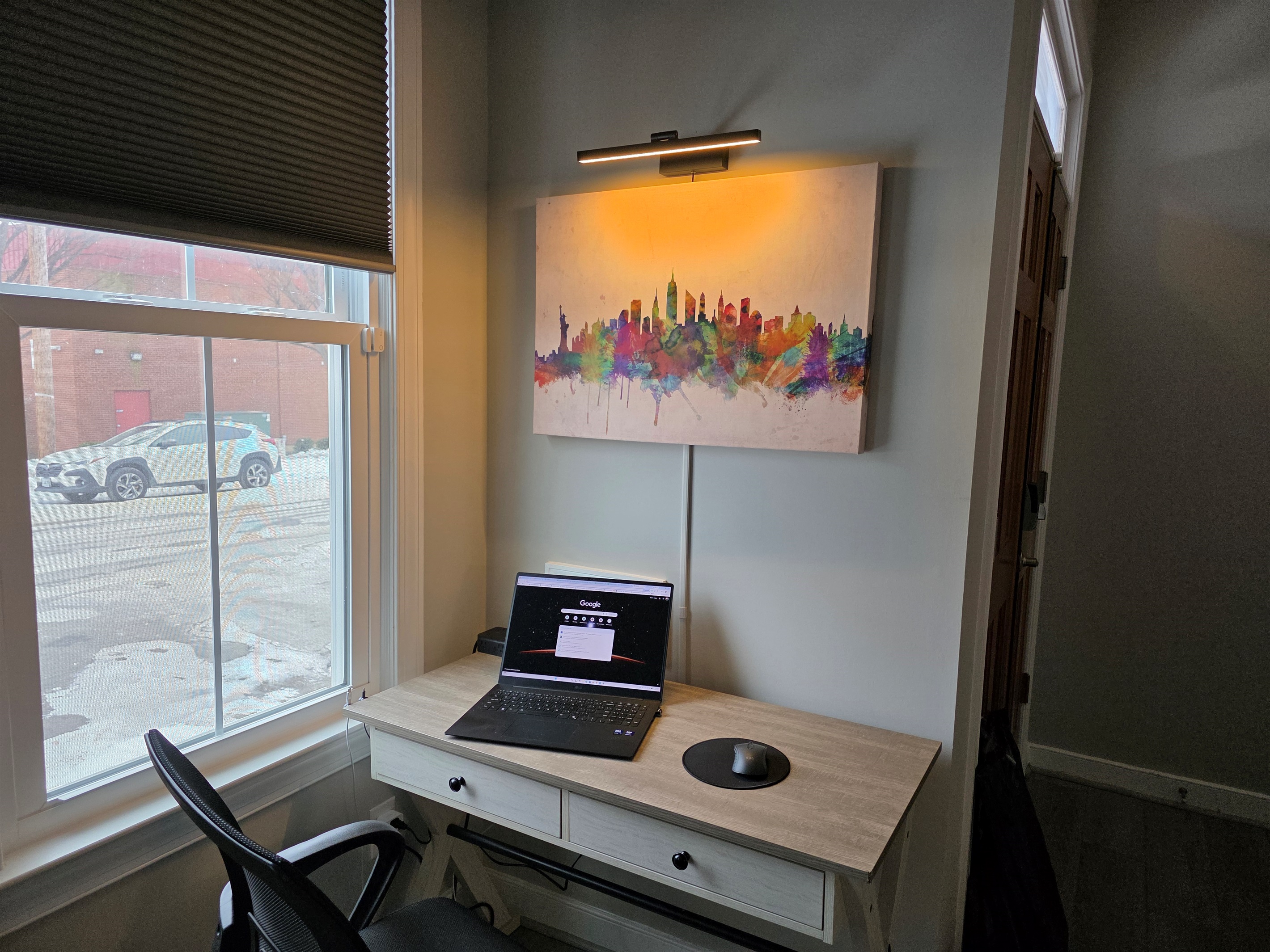 Living Room: Work Station with picture light. To turn on ask "Alexa, turn on Desk" and "Alexa turn off Desk"