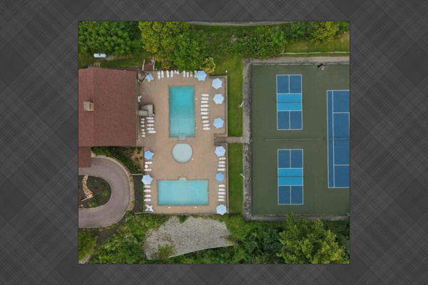 1 of 3 resort pools and tennis courts. Free for guests.