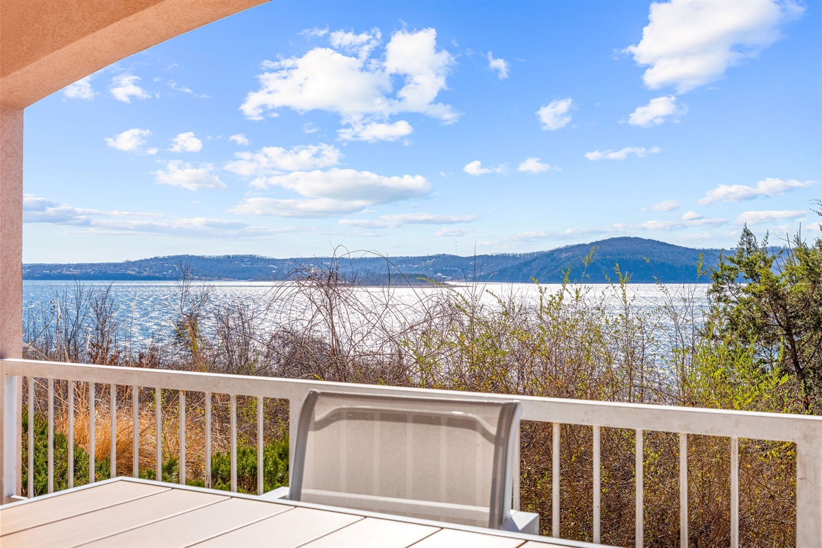 Expansive lake and hillside views.