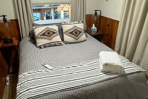 Curl up for a good night's sleep in this first floor bedroom, featuring an electric blanket, snugly comforter and plenty of pillows. No fighting over the thermostat here - each bedroom has it's own thermostat with both heat and air. 