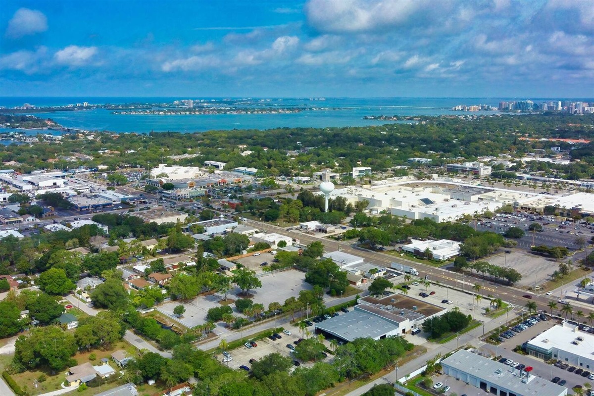 Northwestward aerial view above the home with views of Lido Key and downtown Sarasota.