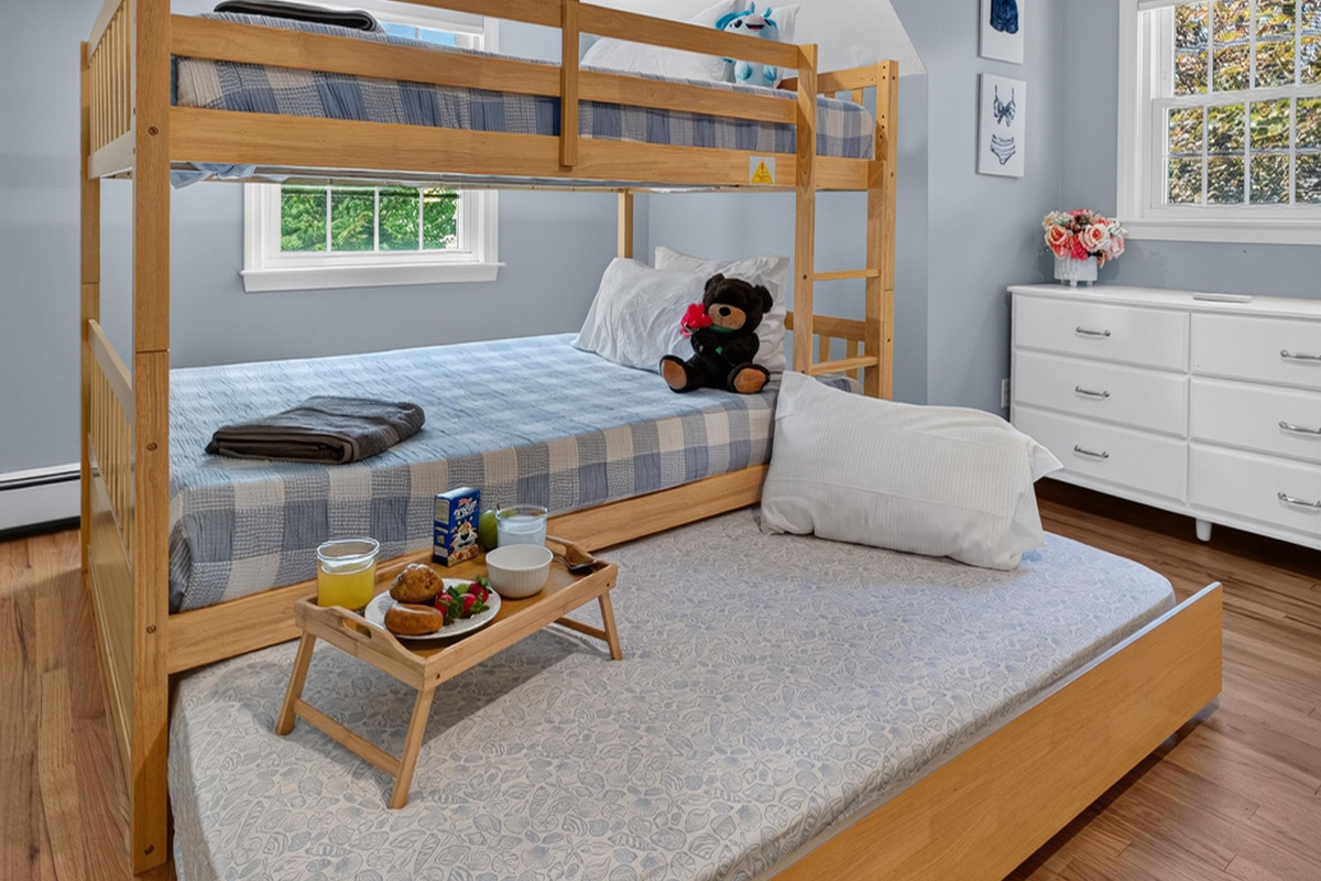 A fun and inviting bedroom where younger guests will feel right at home.