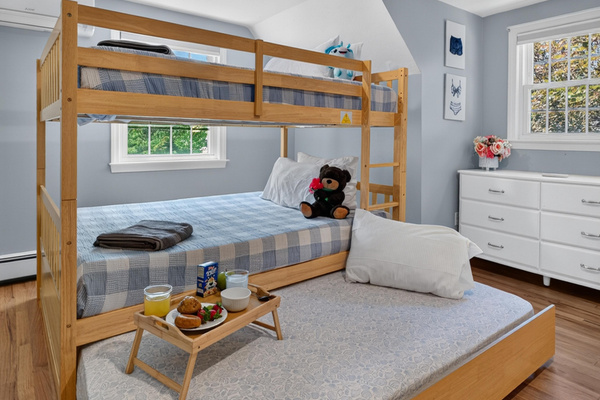 A fun and inviting bedroom where younger guests will feel right at home.