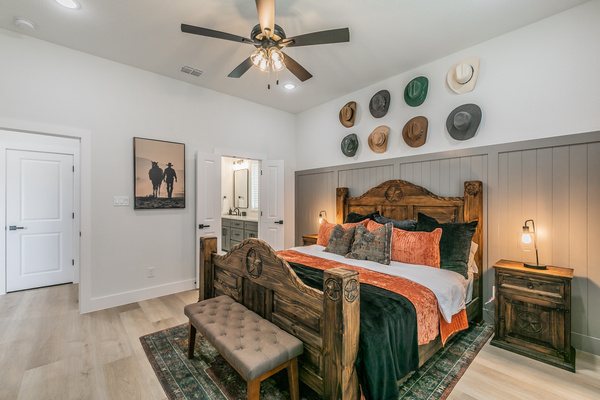 Cowboy Room with king bed, ceiling fan, smart TV and ensuite bathroom