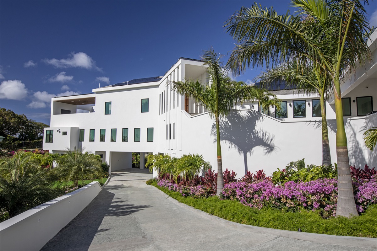 More of Bakkero Villa's beautiful landscaping and wrap around driveway to garage