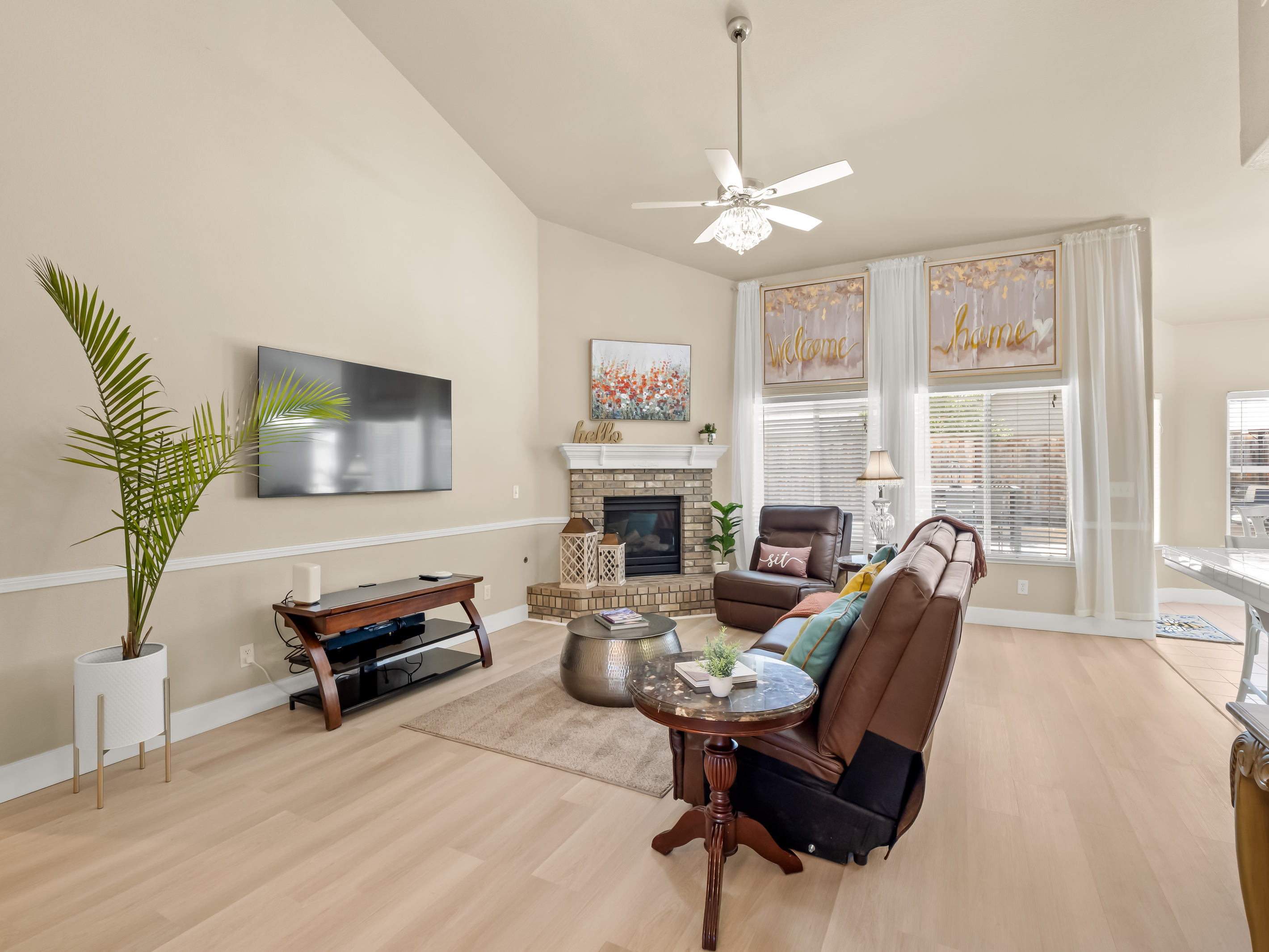 Gather together in this bright and spacious living room. Whether you're watching a movie, enjoying conversation, or simply relaxing, this welcoming space is designed for making memories.