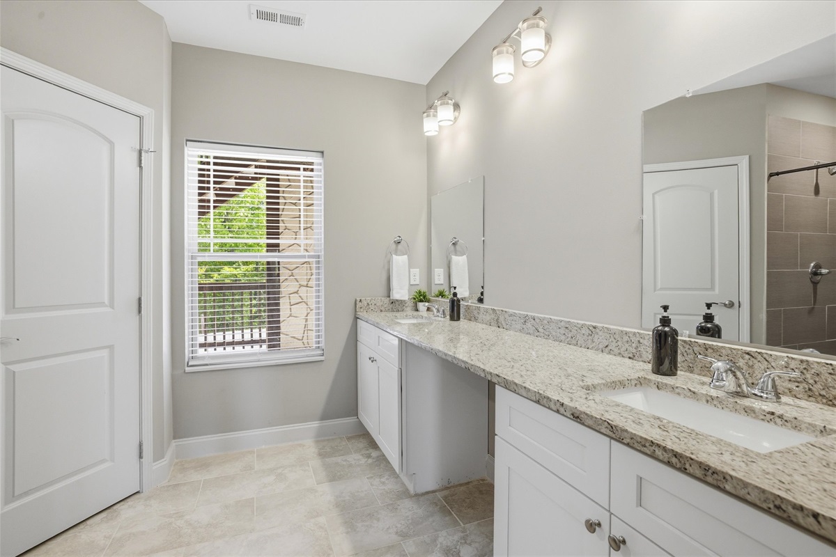 Plenty of room to move here—double sinks, a clean layout, and space that makes getting ready feel more relaxed than rushed, especially in Unit 2.