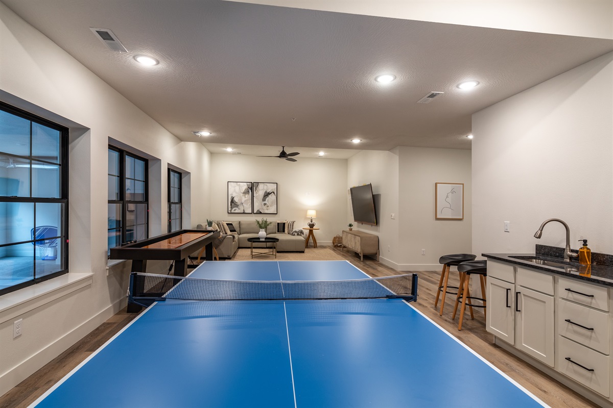 Pool table and shuffleboard downstairs to entertain the family!