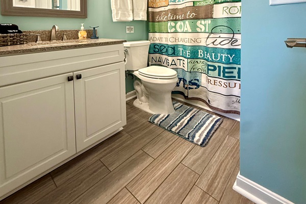 Hall Bath.  Doot from hallway and second bedroom.