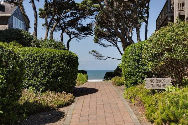 Stroll through the Bella Beach neighborhood, where every path seems to lead straight to the beach.