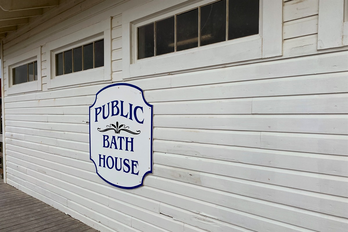 There is a public bath house with showers on the beach. Don't cut your last day short! Spend time on the beach then shower before starting your trip home!