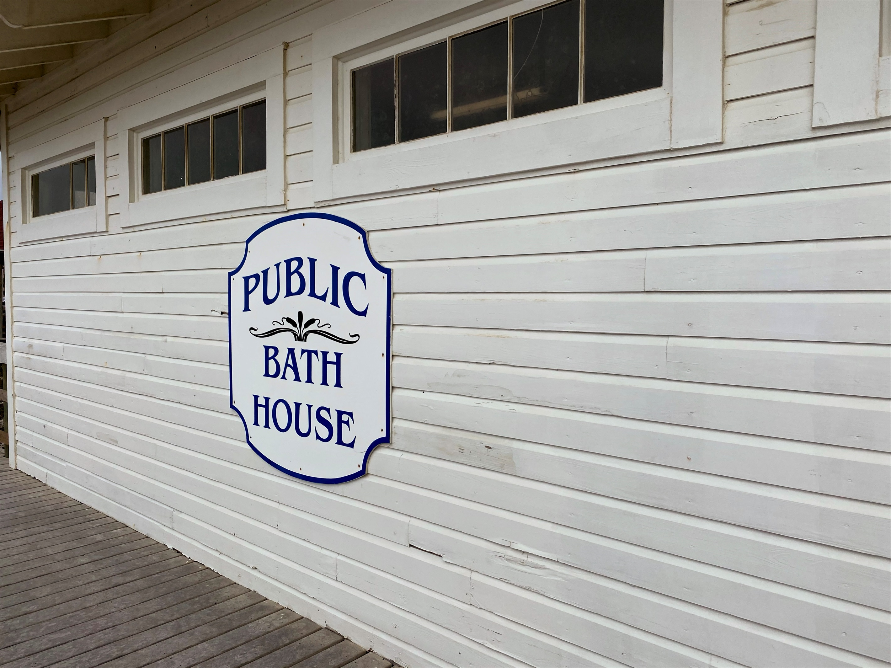 There is a public bath house with showers on the beach. Don't cut your last day short! Spend time on the beach then shower before starting your trip home!