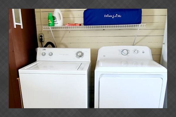 Washer and dryer located on second floor back hallway