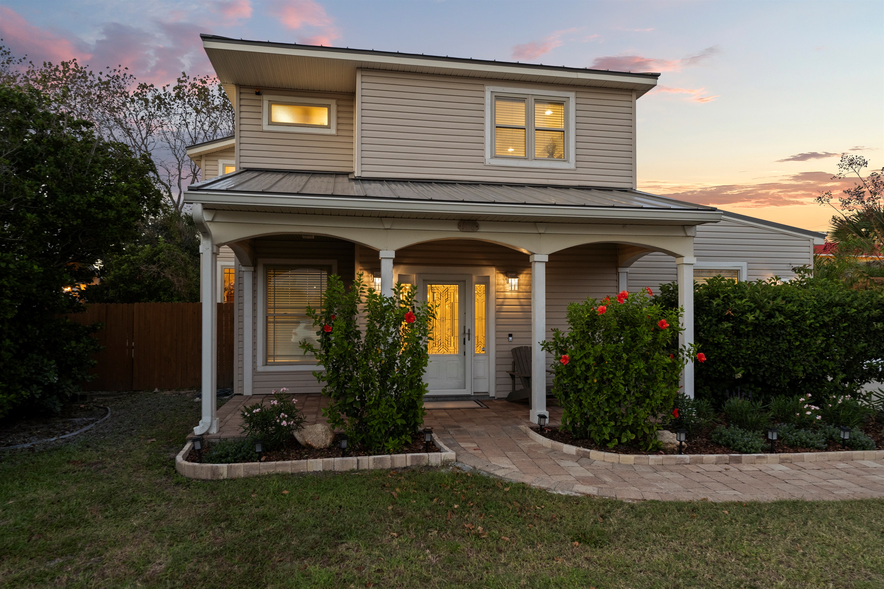 Nighttime view of the front of the house