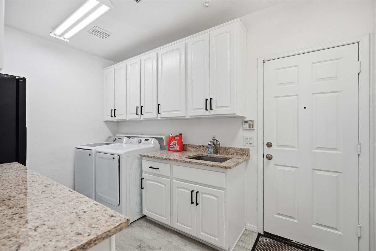 Need to do some laundry? No problem with this large laundry room at your disposal.