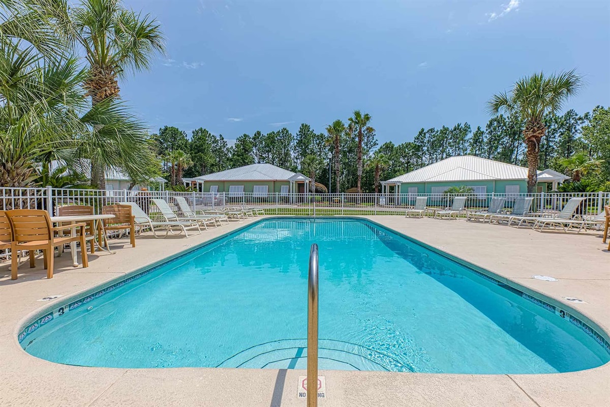 Poolside Paradise: Dive into relaxation with our sparkling pool and sunny lounge area!