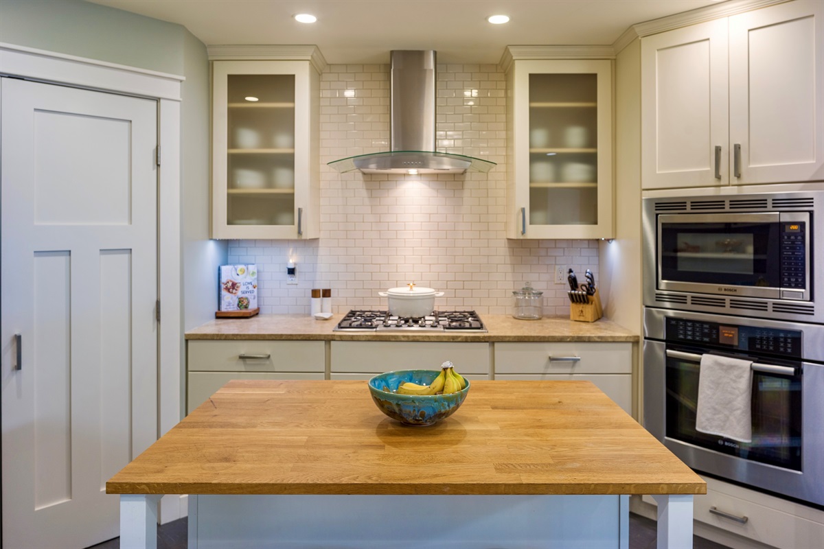 The fully stocked chef style kitchen with a propane stove top invites you to create magical meals featuring local ingredients. 