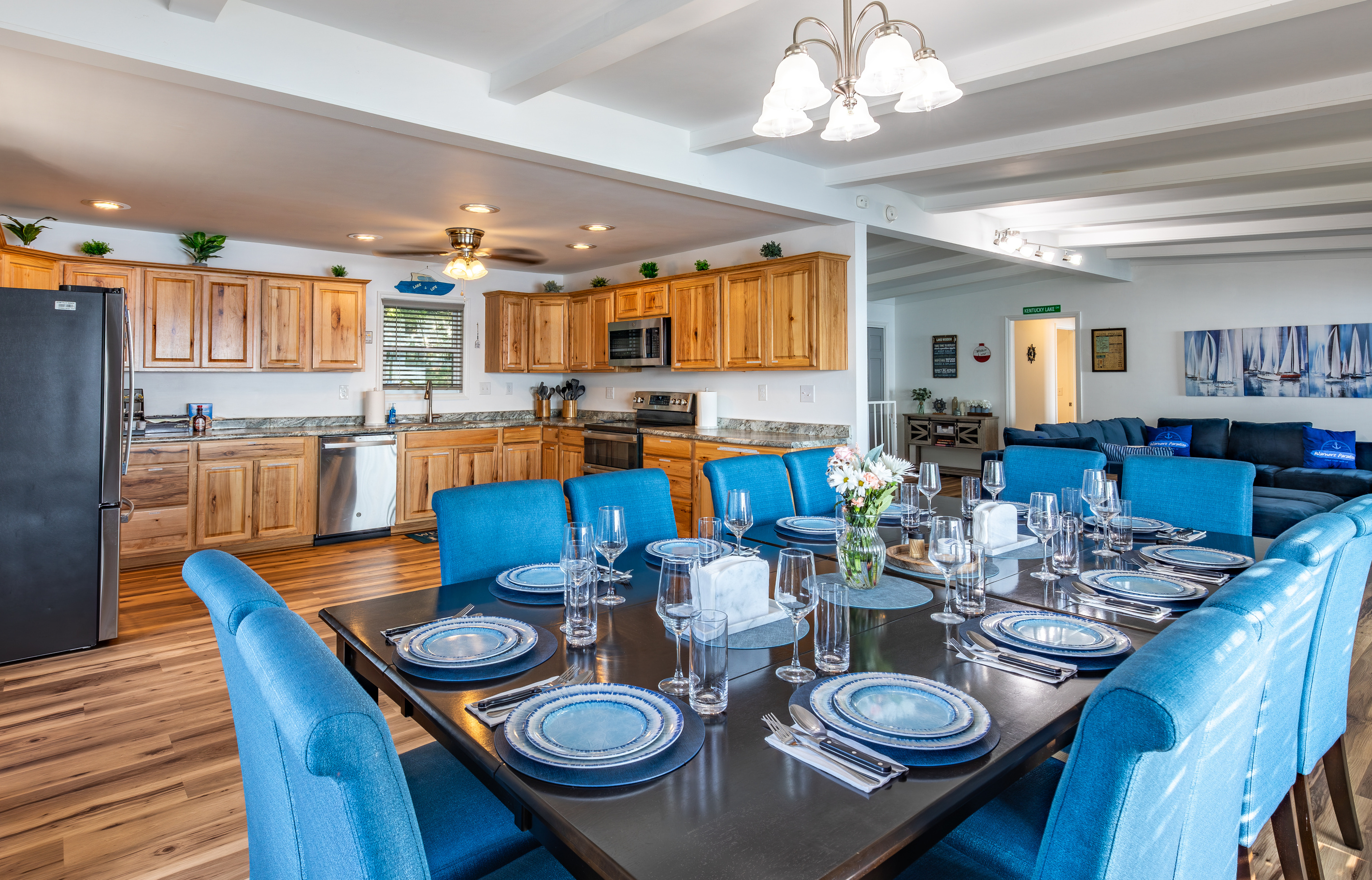 Group dining sits directly beside the kitchen, making serving meals simple and convenient.