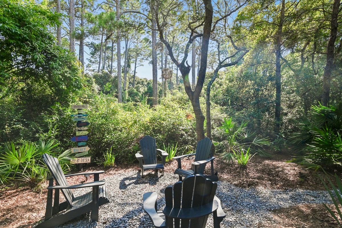 4 Adirondack Chairs - Beautiful wooded views with palms, trees and sounds of birds.