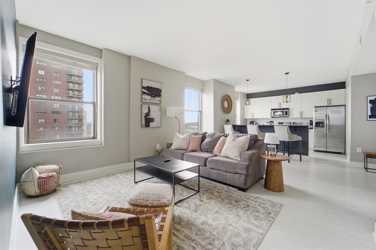 The spacious living room comes equipped with a pullout couch, plush throw pillows and blankets, and fun boardgames for those nights you want to stay in and relax.