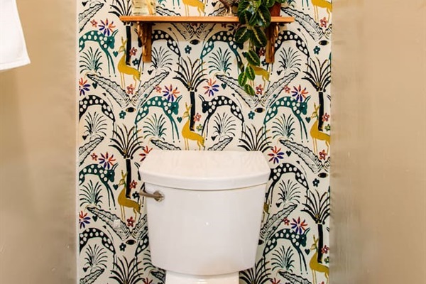 Bohemian-inspired accent bathroom with unique décor, featuring vibrant colors, textured elements, and natural touches that create a relaxed, eclectic atmosphere.