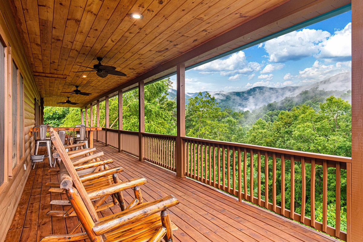 Mountain Majesty: Unwind on this expansive deck with breathtaking views.