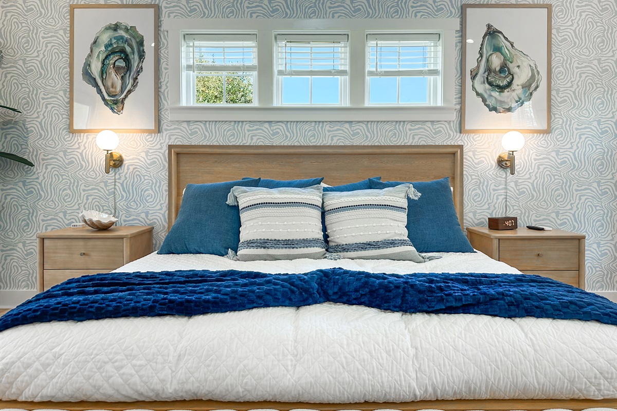 The Oyster King Suite has a luxurious king bed.