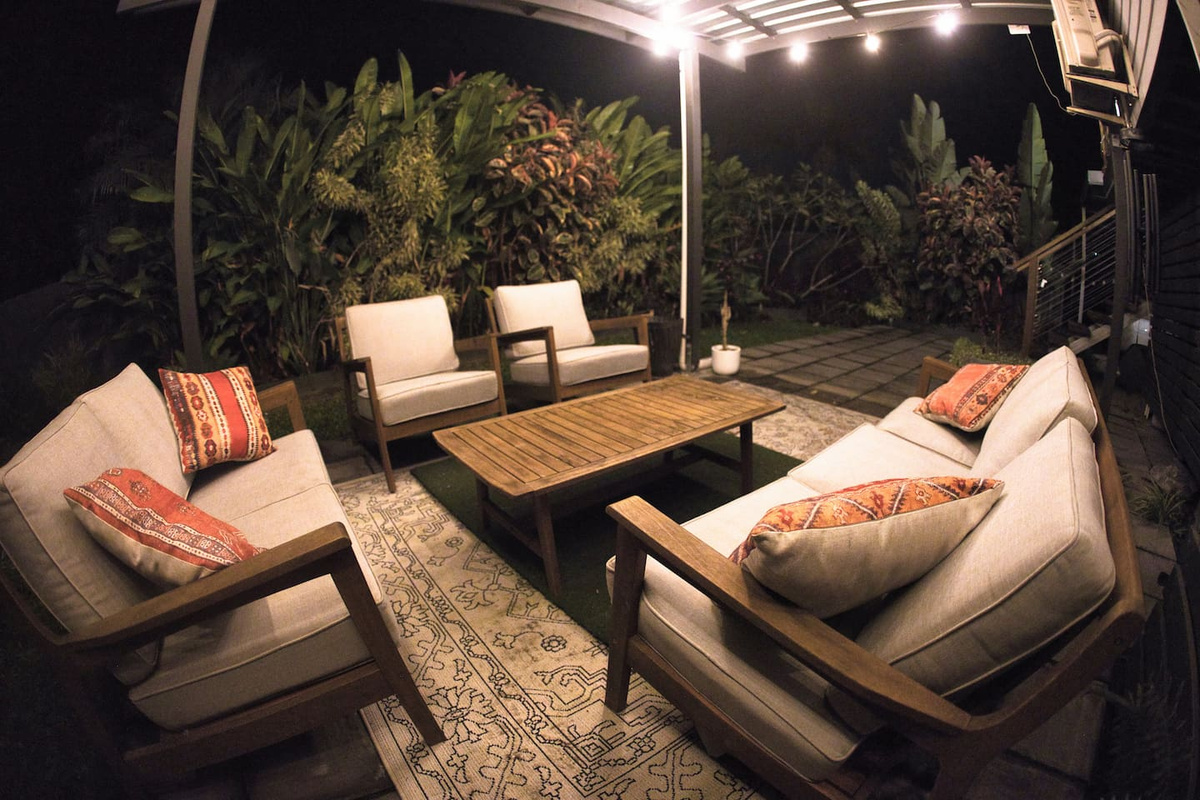 This outside area is a great place for family and friends to have a relaxing time next to the garden.
