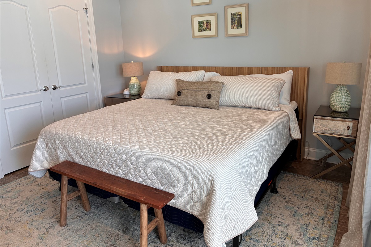 Bedroom 2 with King bed and access to balcony
