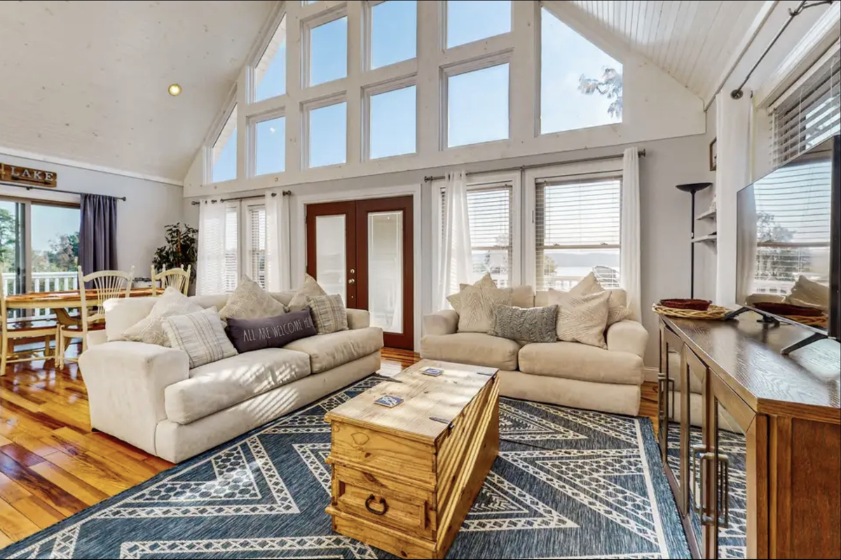 Living Room with Huge Lake and Mountain Views
