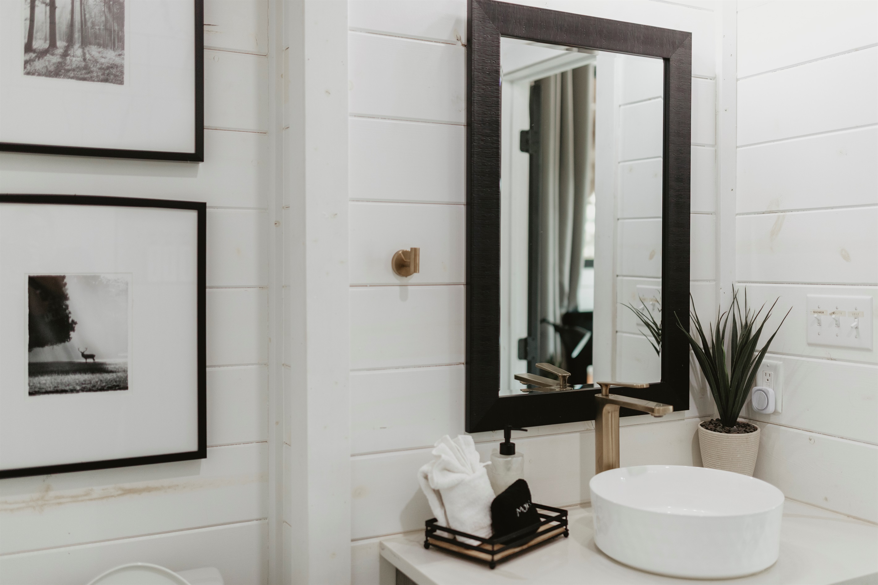 Clean lines and modern finishes make this bathroom a refreshing retreat. With a vessel sink, sleek fixtures, and thoughtful details, it’s a space designed for both style and comfort.
