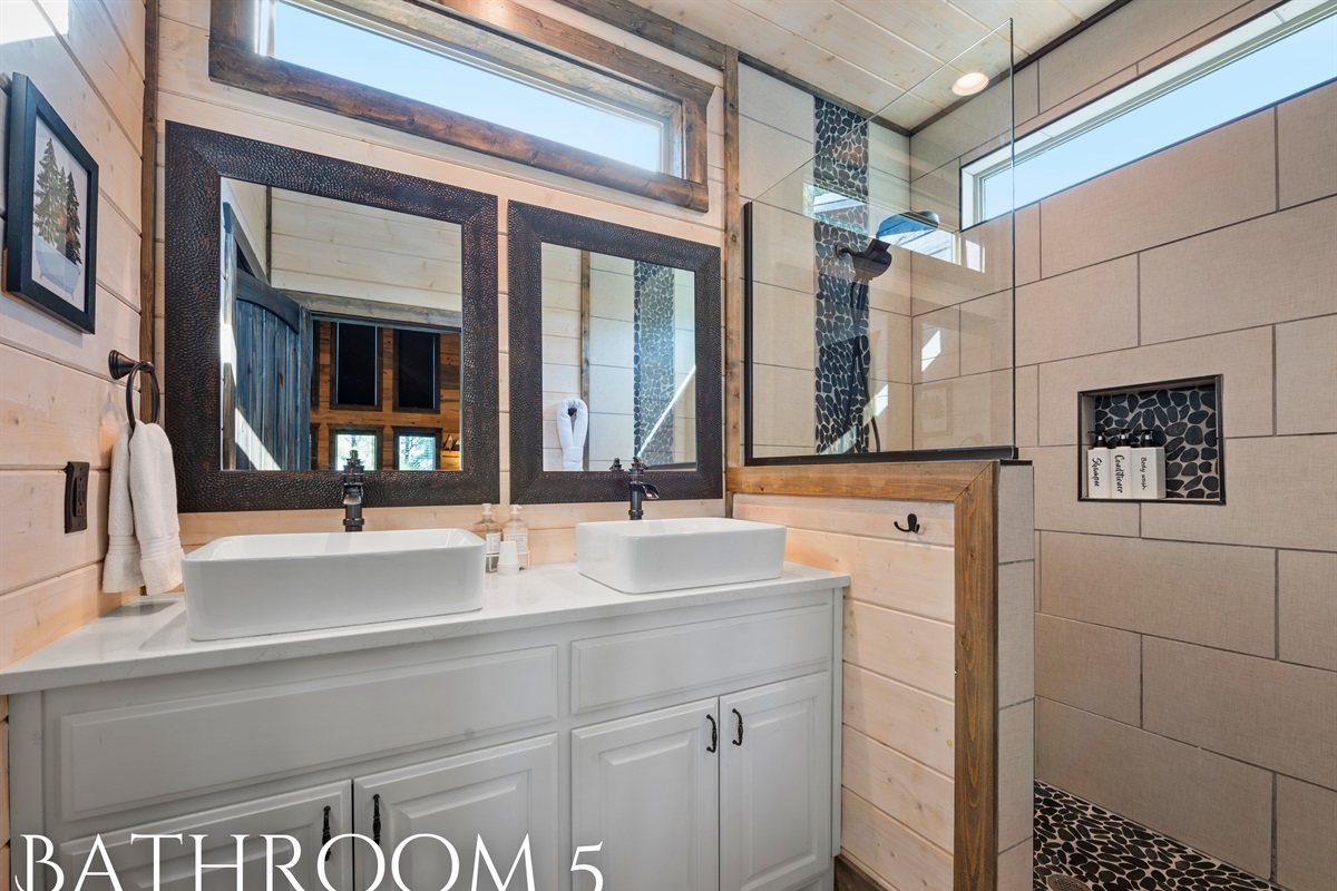 This modern bathroom offers a bright and airy feel, complete with all the essentials for a comfortable stay.