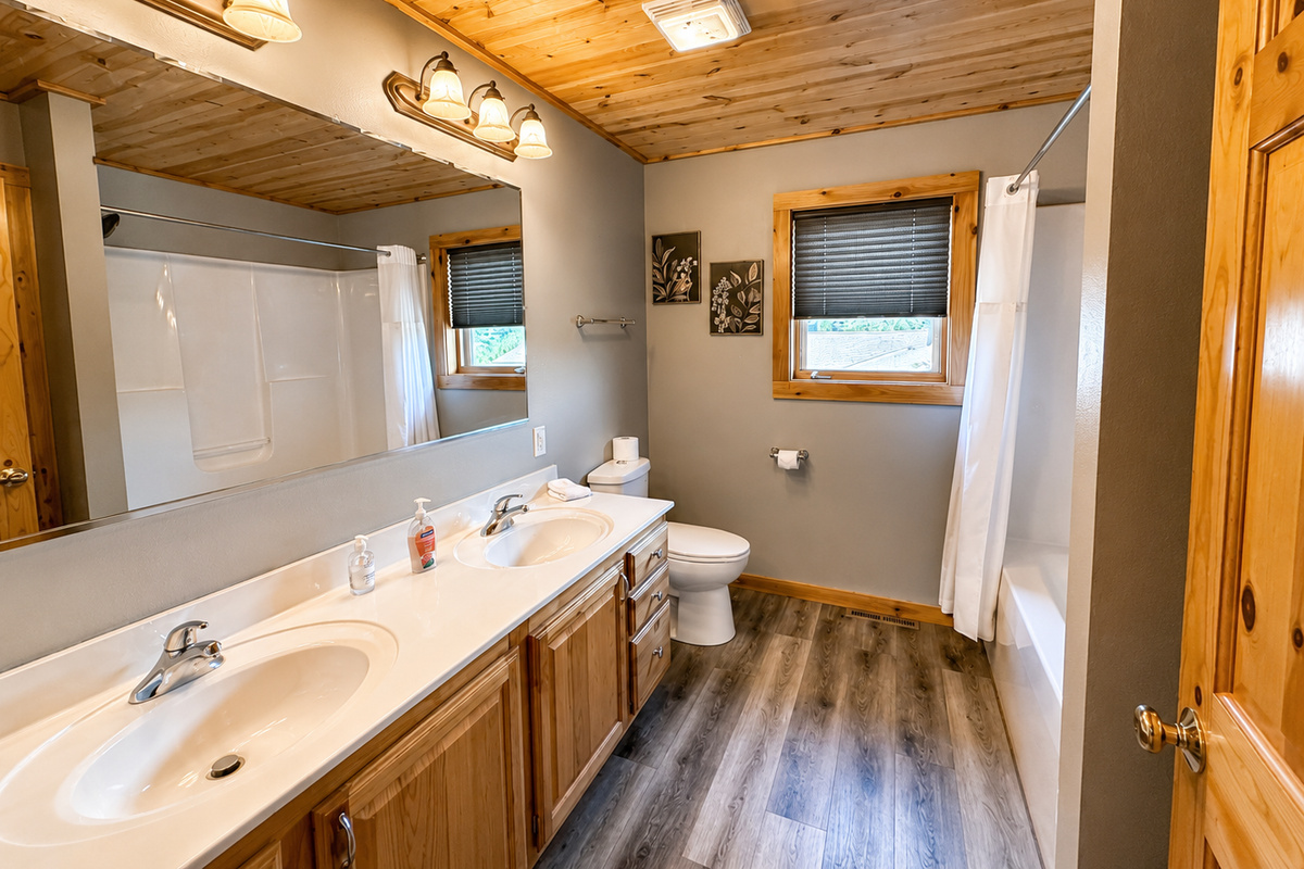Spacious bathroom vanity provides plenty of counter space for getting ready during family and group stays. 