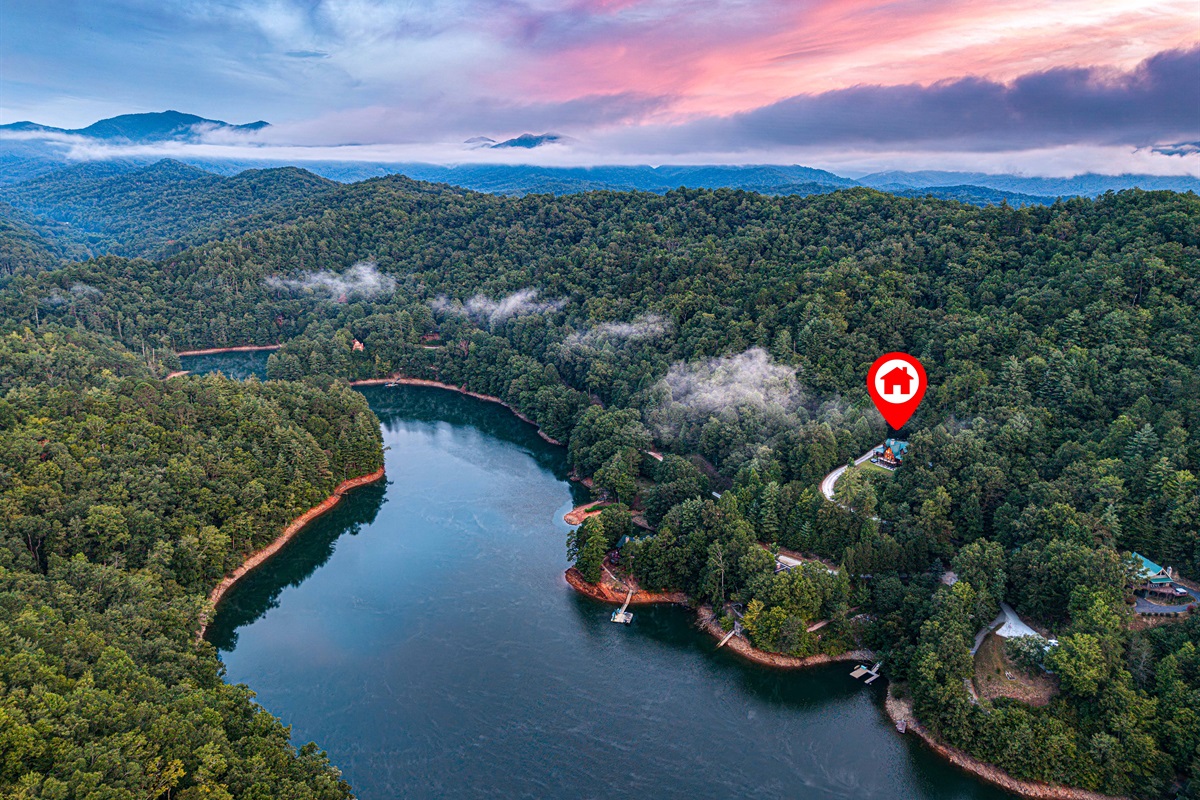 Escape to nature's embrace. Our secluded property offers breathtaking aerial views of the lake and surrounding forests.