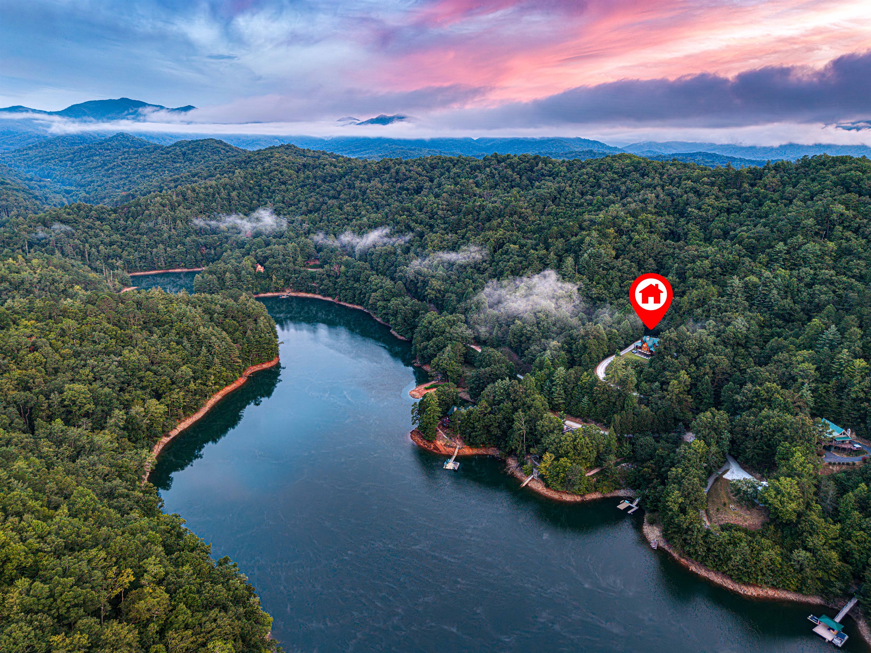 Escape to nature's embrace. Our secluded property offers breathtaking aerial views of the lake and surrounding forests.