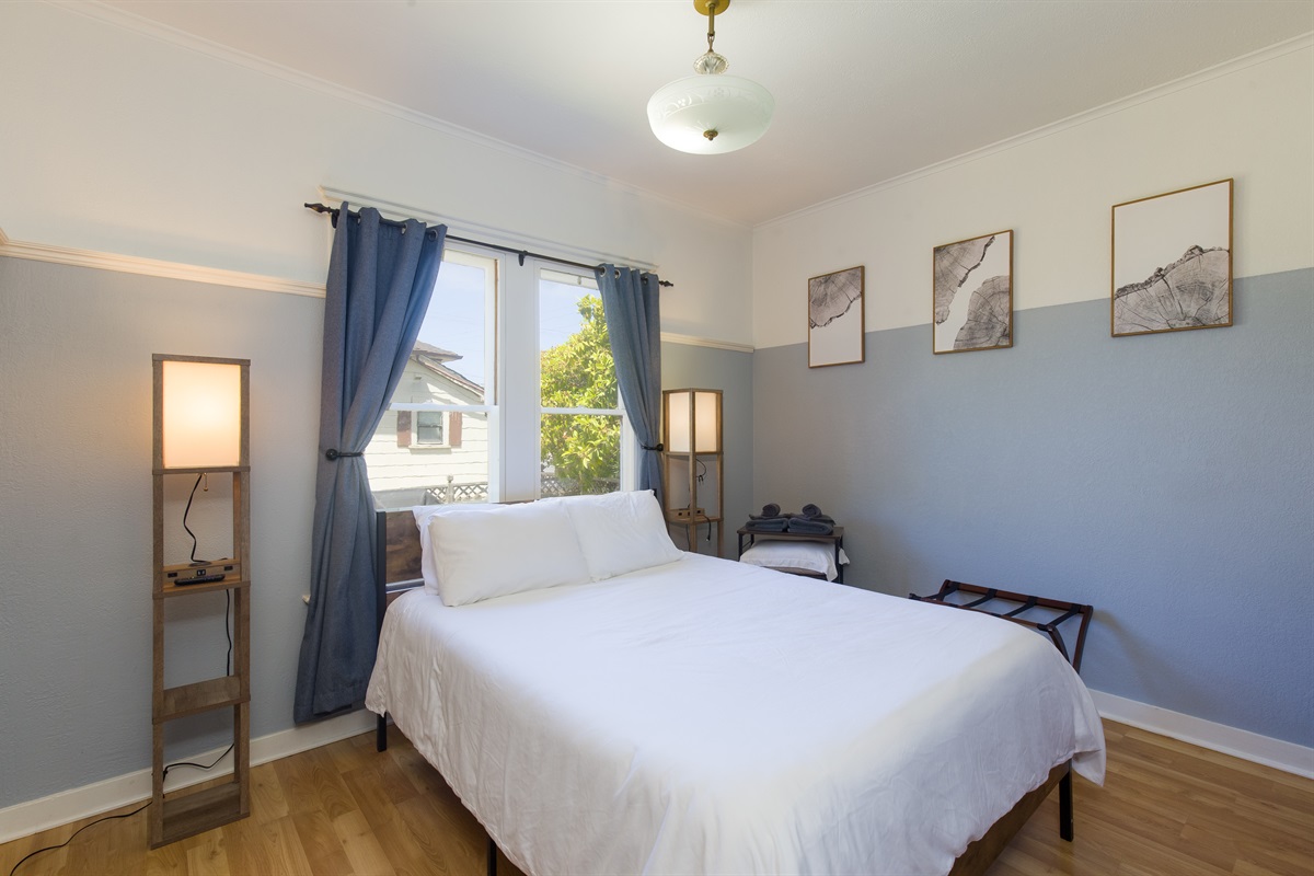 Bedroom 3 with queen bed and Victorian charm