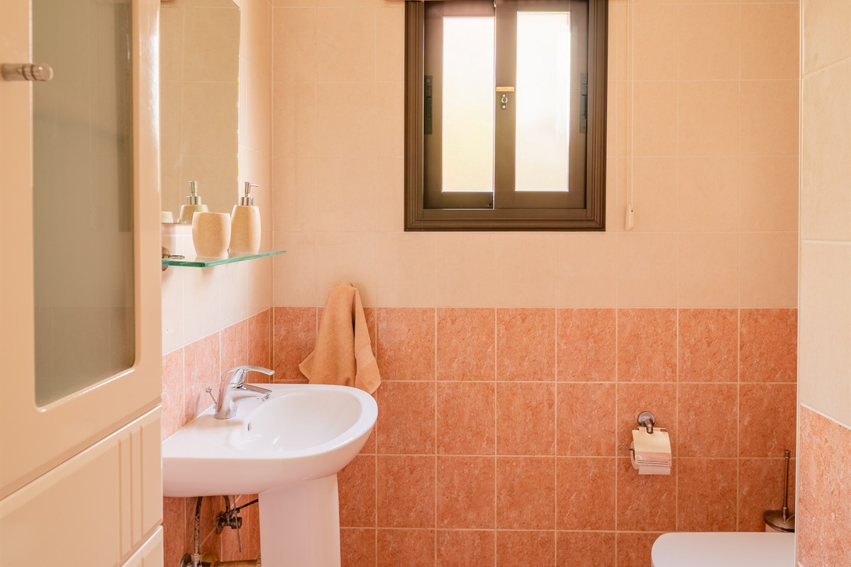 Half bath located downstairs.