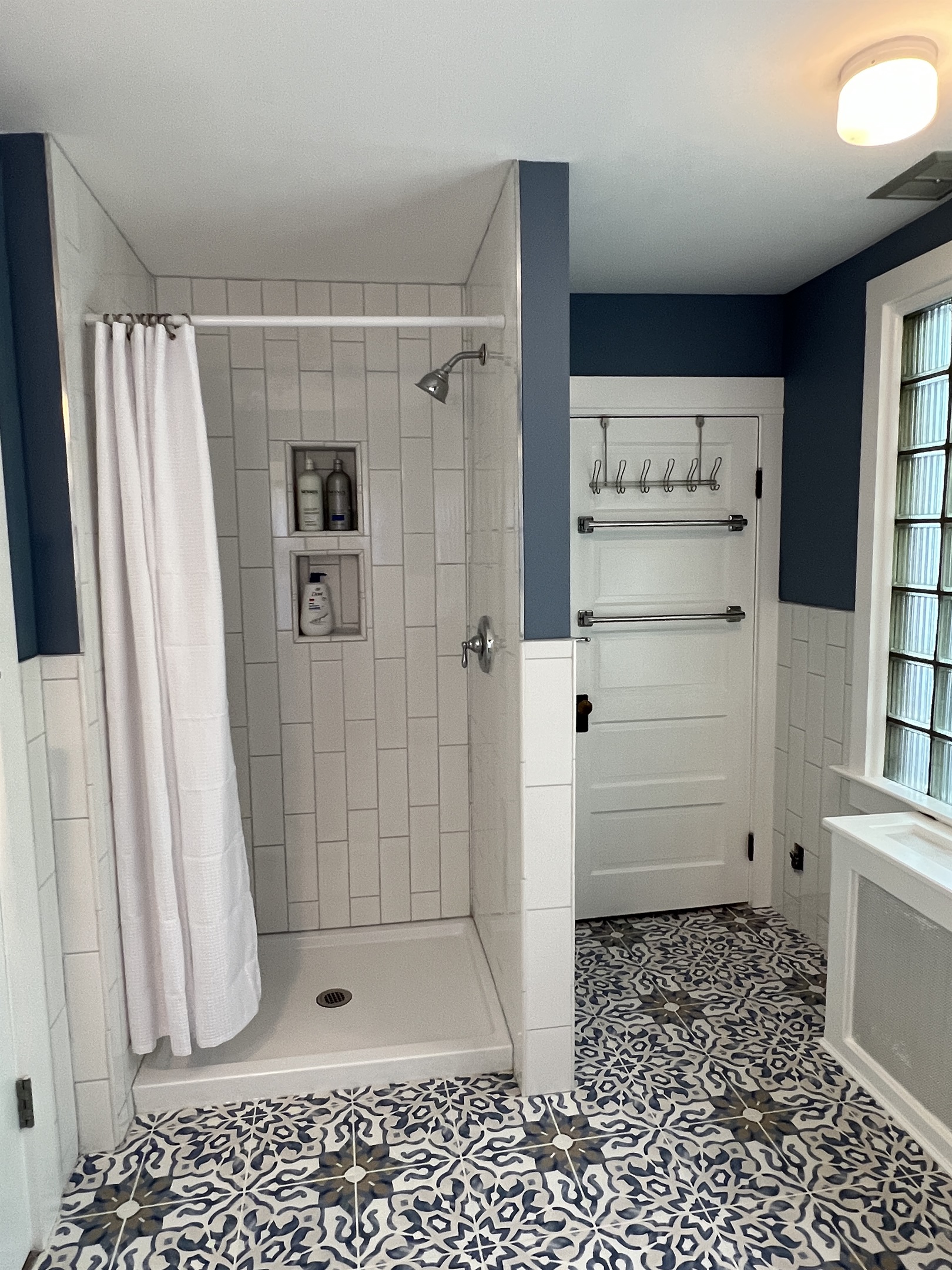 First floor bath w/ shower off hallway near great room