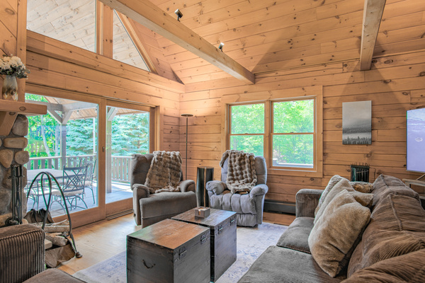 Our 22ft cathedral ceiling offers the most luxurious feel. Sit by the wood-working fireplace and enjoy the mountain life.
