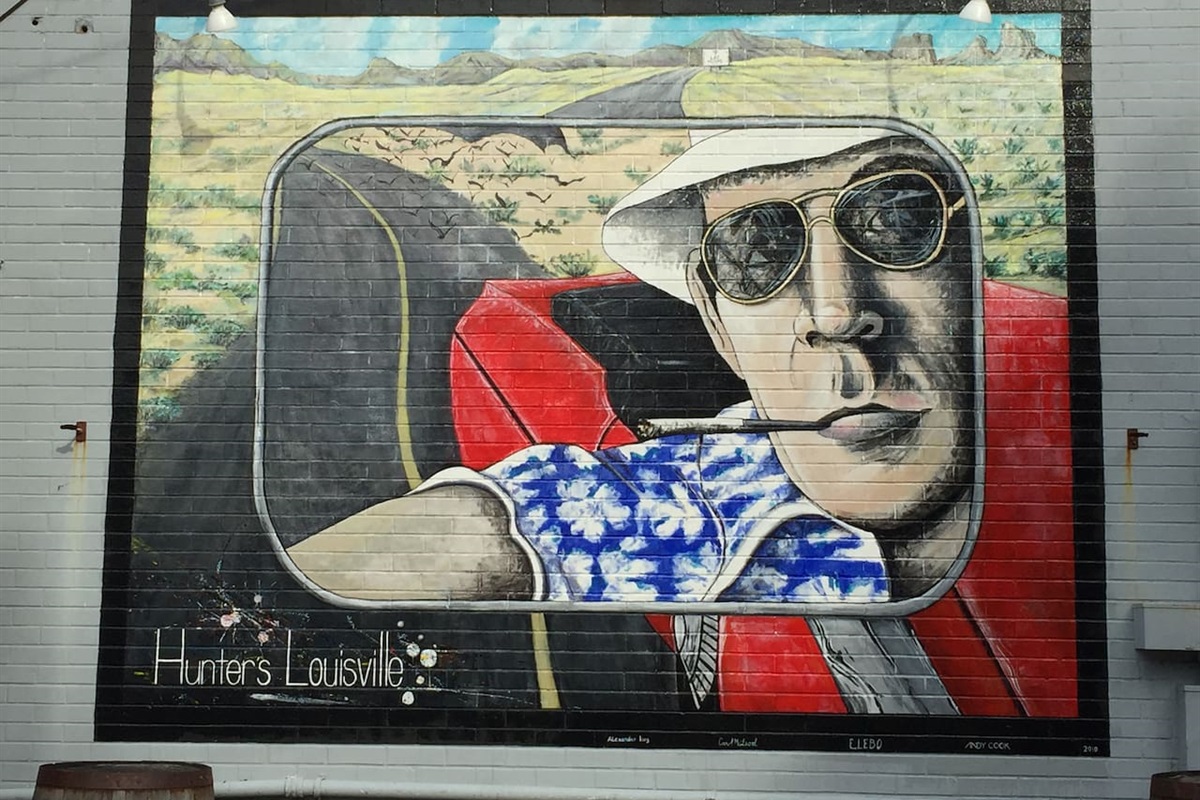 Mural on the side of V-Grits and False Idol Brewery- vegan with outdoor seating on the upper deck