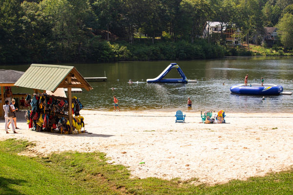 Summer at Lake Monocan, with a sandy beach, swimming and family-friendly water activities at Wintergreen Resort. Photo: Sarah Hauser, Virginia Tourism Corporation