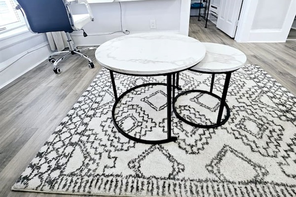 Coffee tables and plush rug