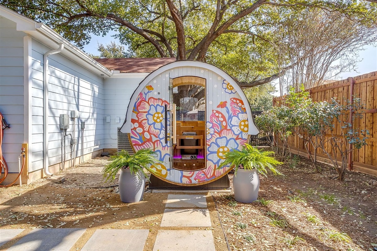 Outdoor barrel sauna for post-pool relaxation