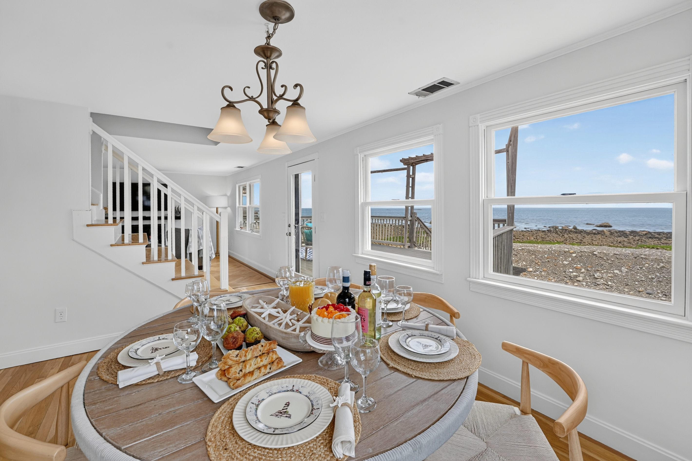 Enjoy a meal with expansive coastal views through the oversized picture window.