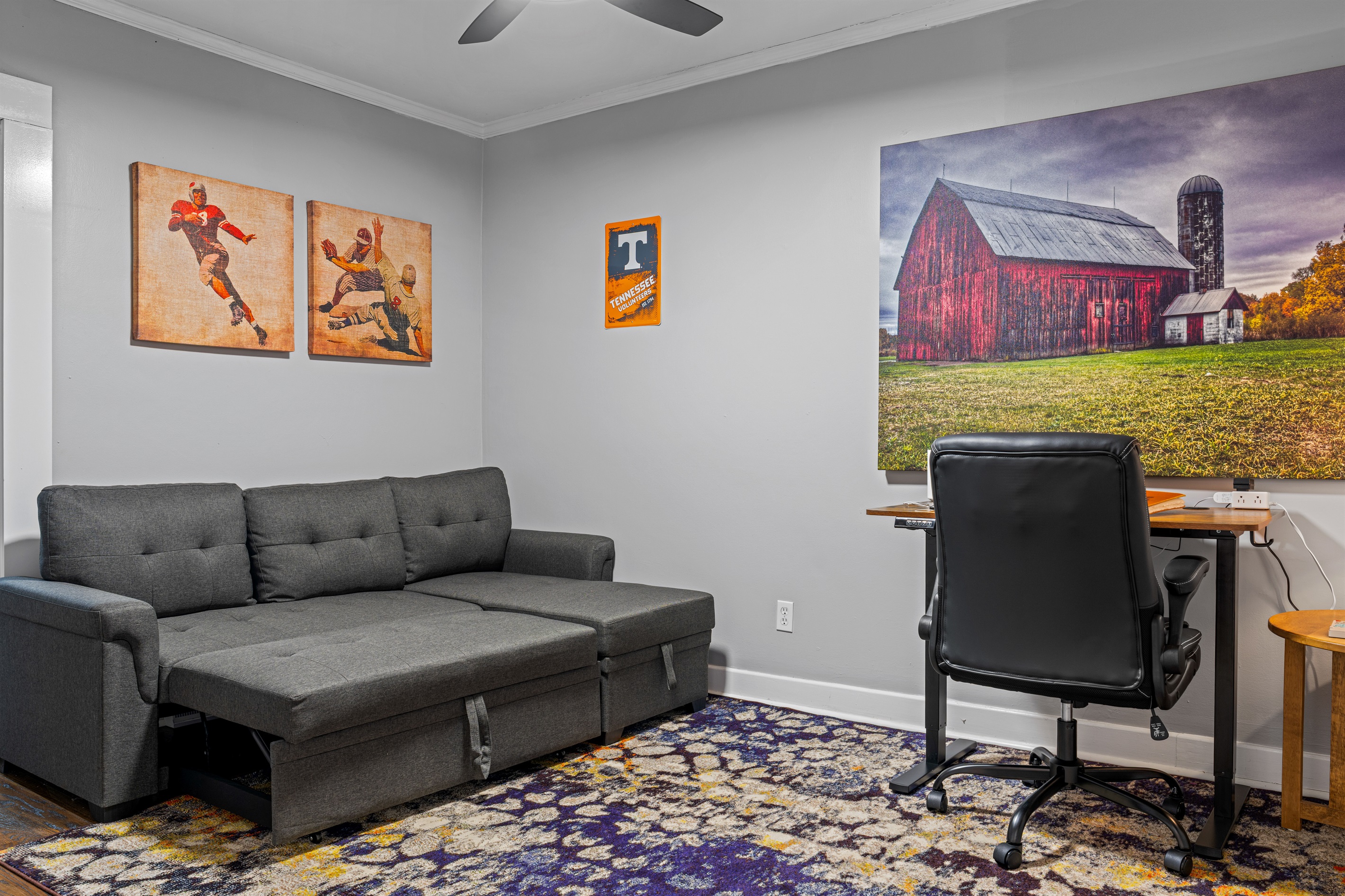 Use this stylish room as a cozy second living space or private office, complete with a sleeper sofa, TV, and comfortable workspace.