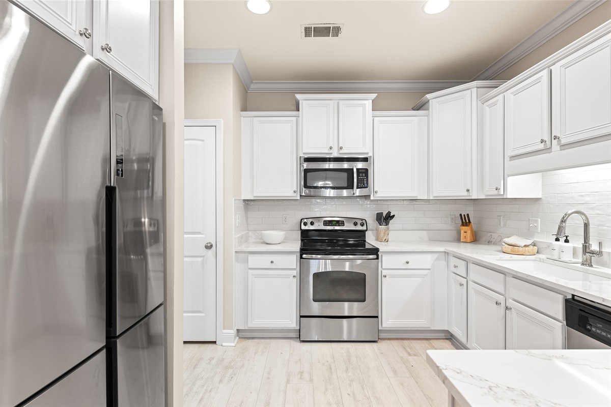 Kitchen & Dining: Fully renovated with high-end appliances, this open area is designed for shared meals and memories.