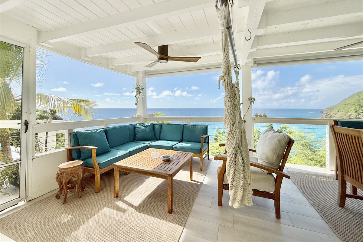 And just past this comfortable lounge set is another entrance to the pool!