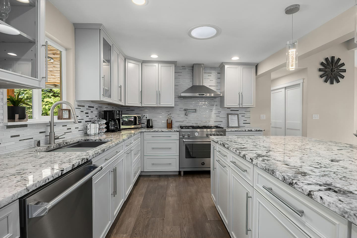 “A chef’s dream—this gourmet kitchen blends high-end finishes with professional-grade appliances, offering a refined space for cooking and gathering.”